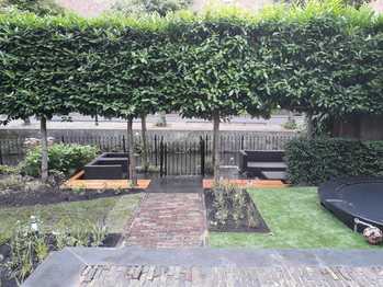 Kunstgras bij vakantiewoning in Voorthuizen